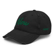 Now In Emerald Embroidery On Distressed Baseball Cap